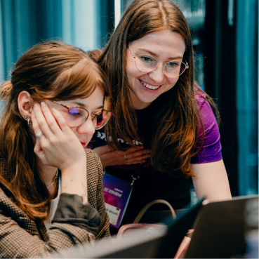 Waves attendees sharing a laugh